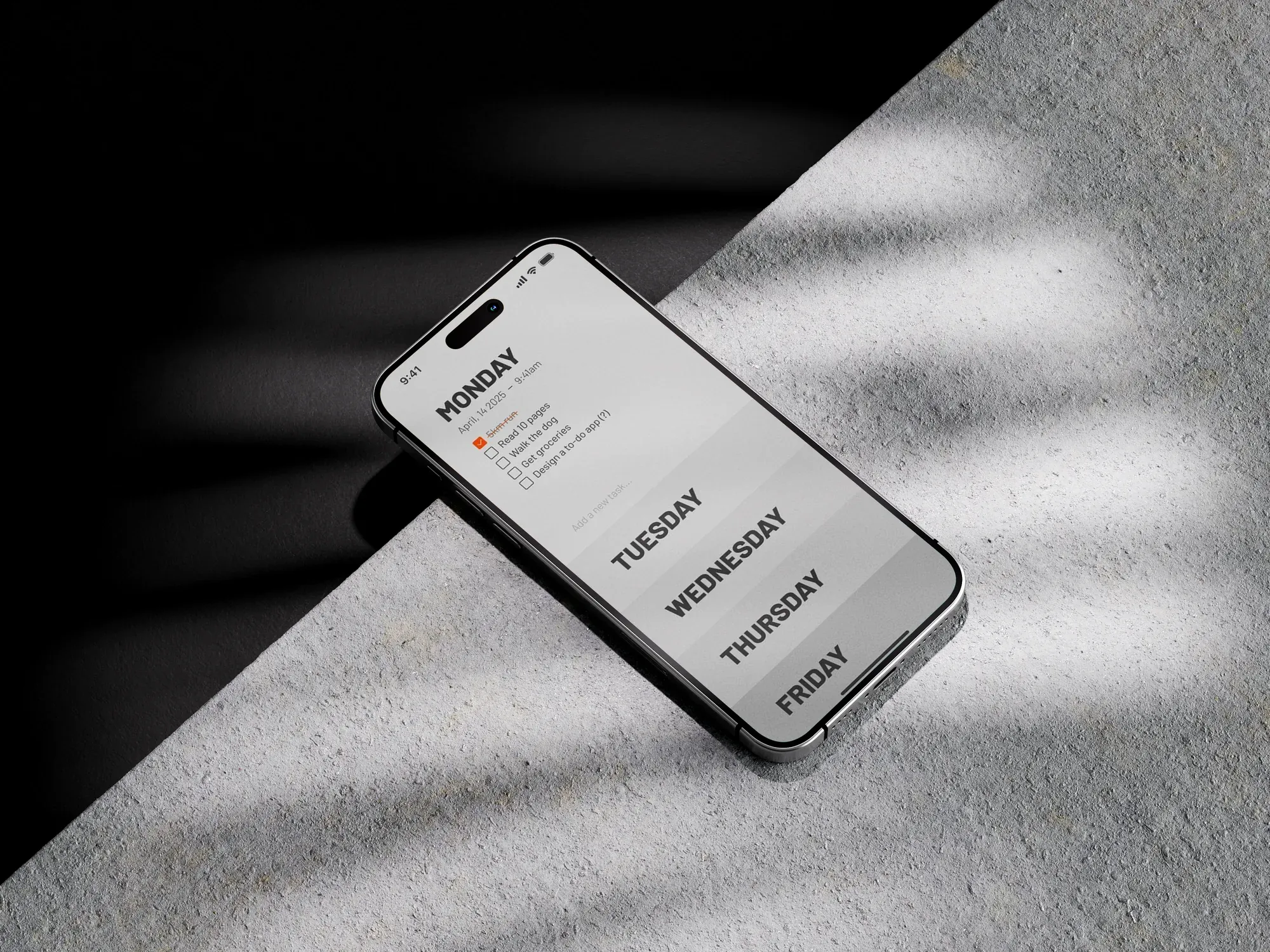 Notes app open on a phone lying on a concrete ledge